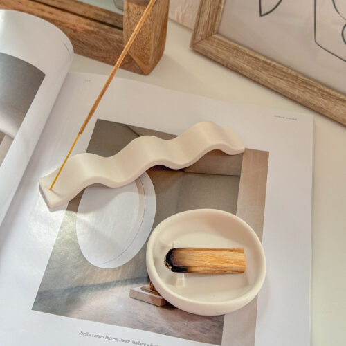 Wavy Incense & Palo Santo Holder SET lying on a vogue living magazine