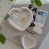 Heart Jewelry Dish placed on book together with small heart bowl and heart image holder